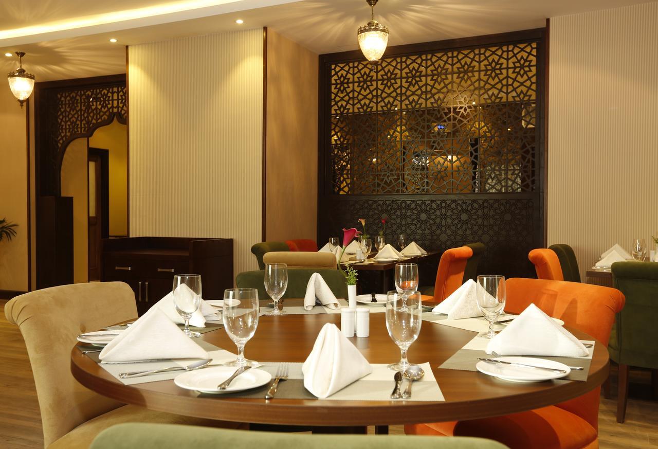 Swiss Flora Inn Hotel Riadh Exterior foto